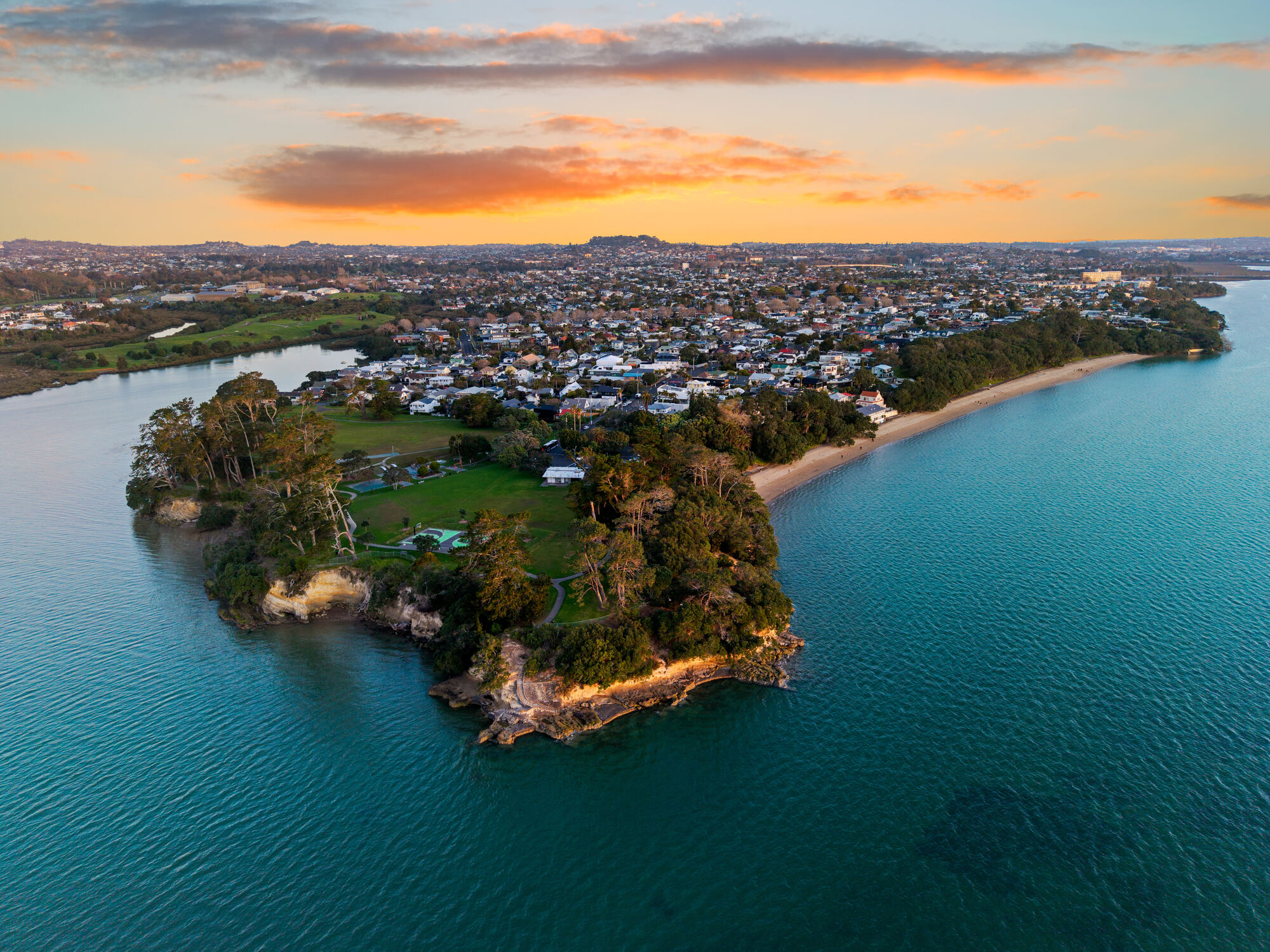 Pt Chevalier and the Auckland coastline at sunset